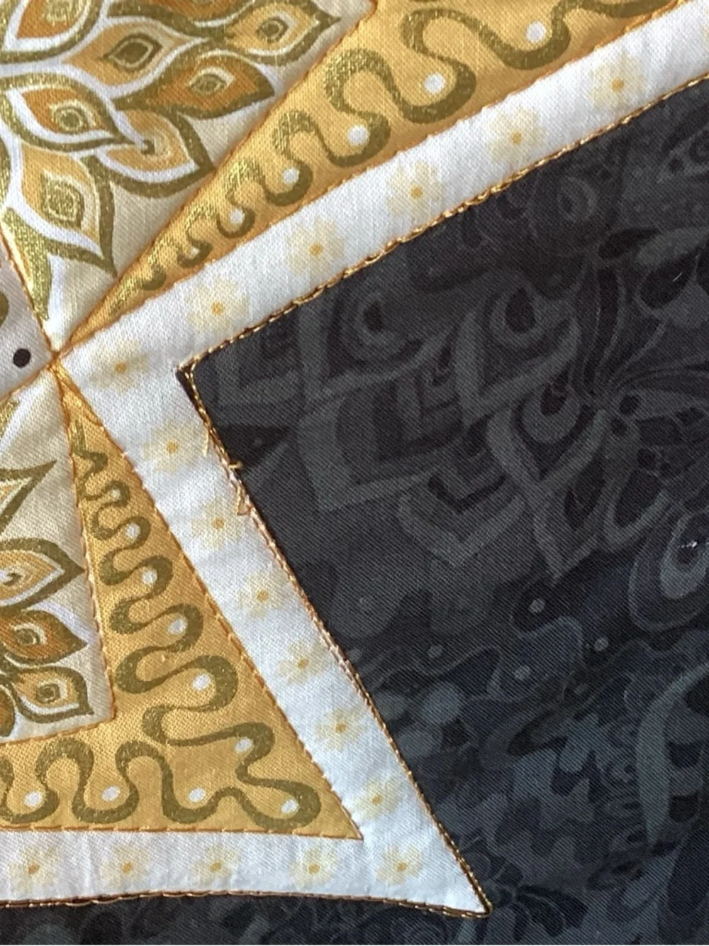 NWT. Gold and Black Star Lap Quilt